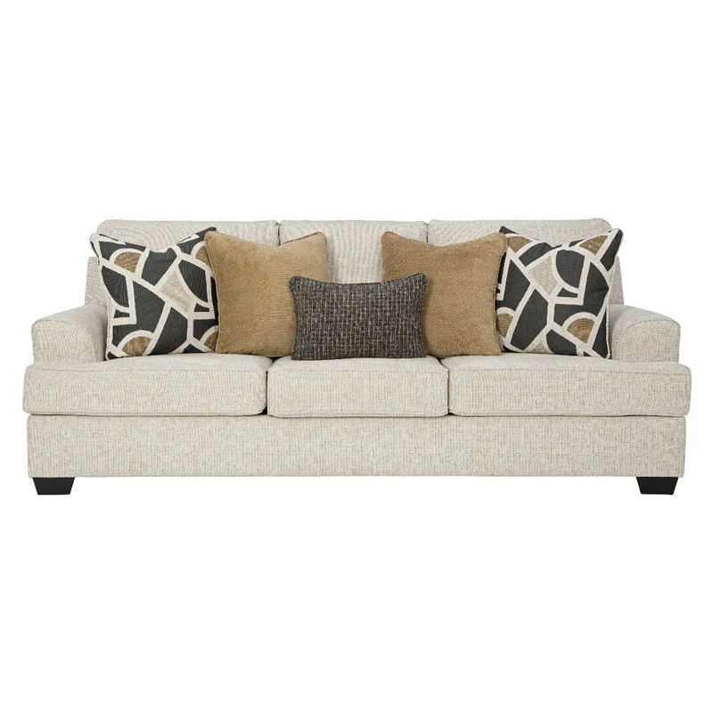 Sofa en tissu beige pâle avec coussins - Heartcort